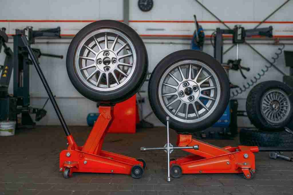 Car tyres on wheel jack